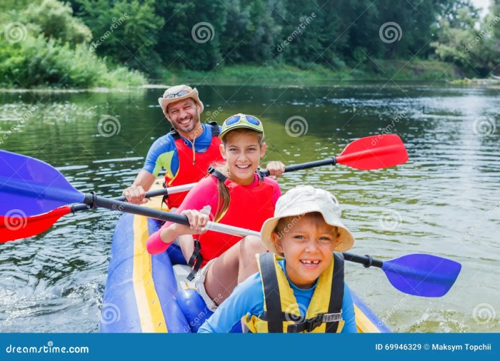 Family kayaking river experience adventurous enjoying active brother father having together happy fun her girl Family kayaking river experience adventurous enjoying active brother father having together happy fun her girl